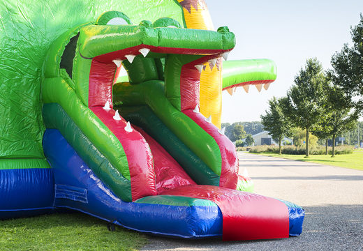 Order inflatable indoor multifun super bounce house with slide in crocodile theme for children. Buy inflatable bounce houses online at JB Inflatables America