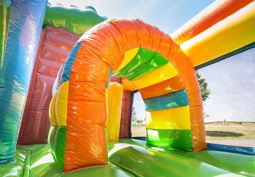 Medium inflatable fairytale-themed bounce house with slide for children. Order inflatable bounce houses online at JB Inflatables America
