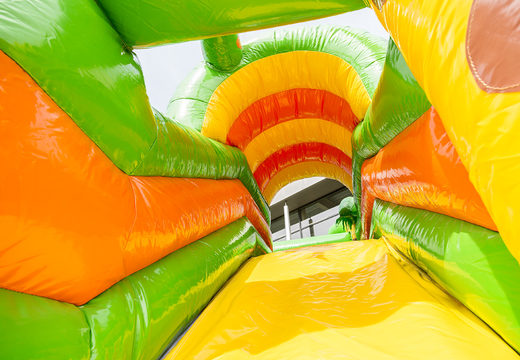 Bounce house in safari gorilla theme with slide, fun objects on the jumping surface and striking 3D objects for children. Buy inflatable bounce houses online at JB Inflatables America