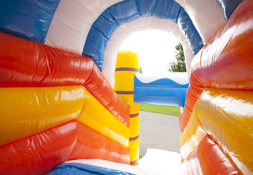 Multiplay clownfish bounce house with a slide, fun objects on the jumping surface and striking 3D objects for children. Order inflatable bounce houses online at JB Inflatables America