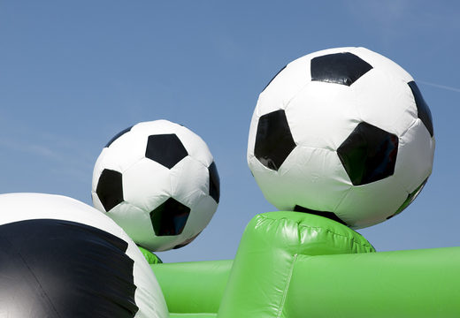 Football themed bouncy castle with slide, fun objects on the jumping surface and striking 3D objects for children. Buy inflatable bouncy castles online at JB Inflatables America