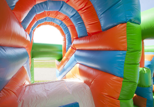 Buy a medium inflatable multiplay bounce house in football theme with slide for children. Order inflatable bounce houses online at JB Inflatables America