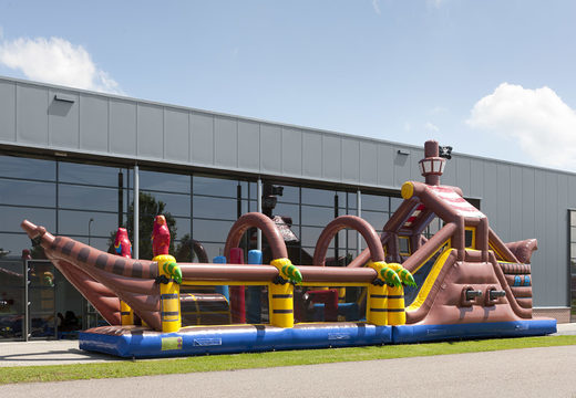 Buy a 17-metre-wide pirate-themed inflatable obstacle course with 7 game elements and colorful objects for kids. Order inflatable obstacle courses now online at JB Inflatables America