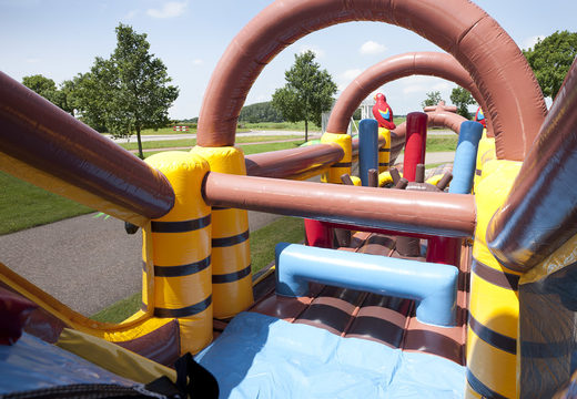 Order a 17 meter wide unique inflatable pirate themed obstacle course for kids. Buy inflatable obstacle courses online now at JB Inflatables America
