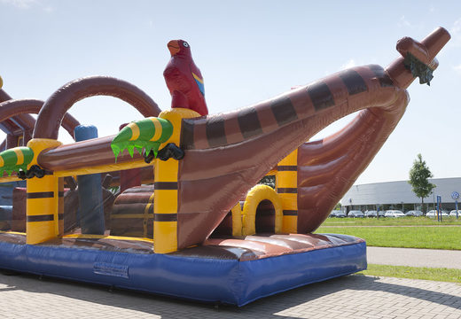 Unique 17 meter wide pirate themed obstacle course with 7 game elements and colorful objects for kids. Buy inflatable obstacle courses online now at JB Inflatables America