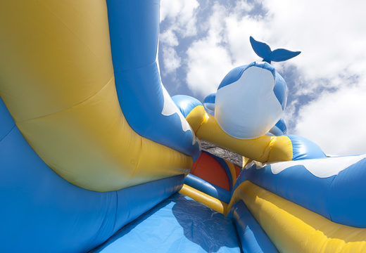 Inflatable slide in the dolphin theme with a splash pool, impressive 3D object, fresh colors and the 3D obstacle for children. Order inflatable slides now online at JB Inflatables America