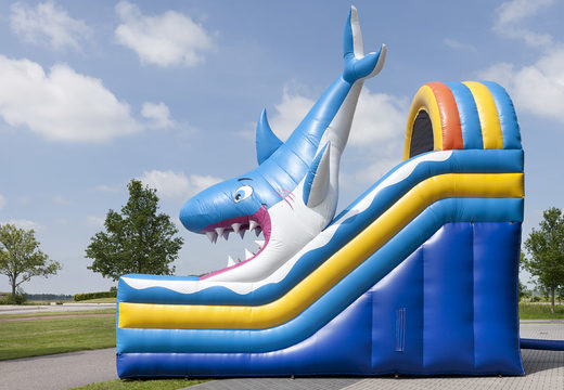 Multifunctional shark-themed inflatable slide with a splash pool, impressive 3D object, fresh colors and the 3D obstacles for kids. Order inflatable slides now online at JB Inflatables America