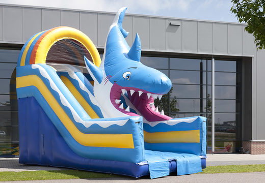 Shark themed multifunctional inflatable slide with a splash pool, impressive 3D object, fresh colors and the 3D obstacles to buy for kids. Order inflatable slides now online at JB Inflatables America