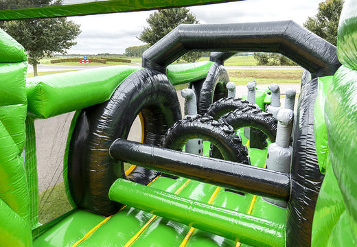 Buy inflatable obstacle course 17 meters wide, tractor themed with 7 game elements and colorful objects for children. Order inflatable obstacle courses now online at JB Inflatables America