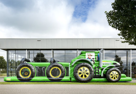 Order a 17 meter wide, unique tractor themed obstacle course for kids. Buy inflatable obstacle courses online now at JB Inflatables America