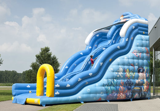 Get your wave themed inflatable slide with wavy sliding surface and fun underwater world prints for kids. Order inflatable slides now online at JB Inflatables America