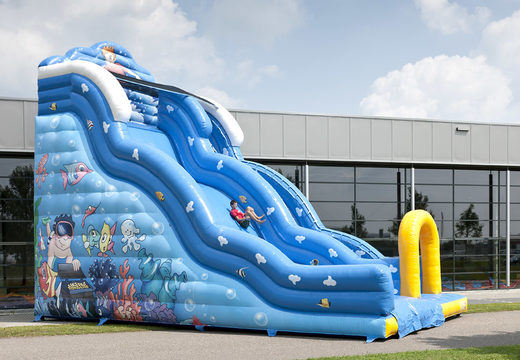 Order an inflatable slide in the Wave theme with a wavy sliding surface and fun underwater world prints for kids. Buy inflatable slides now online at JB Inflatables America