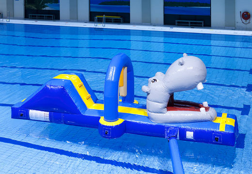 Inflatable hippo run obstacle course with fun objects for both young and old. Order inflatable obstacle courses online now at JB Inflatables America