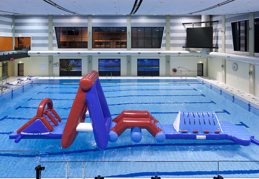Buy an inflatable Water obstacle run strom course with two climbing walls, a balancing object, a pendulum tower and a slide for both young and old. Order inflatable water attractions now online at JB Inflatables America