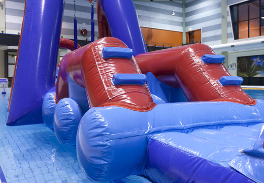 Order Water obstacle run obstacle course with two climbing walls, a balancing object, a pendulum tower and a slide for both young and old. Buy inflatable water attractions online now at JB Inflatables America