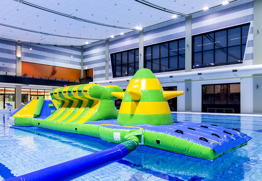 Spectacular inflatable adventure run green/blue 10m swimming pool with challenging obstacle objects and round slide for both young and old. Buy inflatable water attractions online now at JB Inflatables America