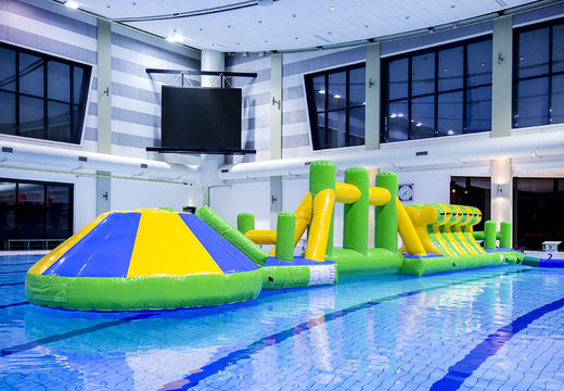 Order unique inflatable adventure run green/blue 16m swimming pool with challenging obstacle objects and round slide for both young and old. Buy inflatable water attractions online now at JB Inflatables America
