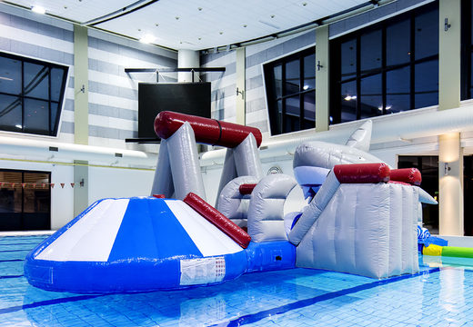 Get an airtight inflatable shark play island with a vine, climbing tower, round slide and obstacles for both young and old. Order inflatable pool games now online at JB Inflatables America