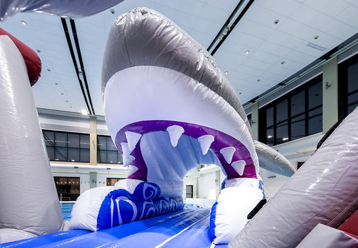 Spectacular shark-themed play island with a vine, climbing tower, round slide and obstacles for both young and old. Buy inflatable pool games online now at JB Inflatables America