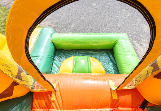 Buy small inflatable bouncer  in jungle theme with slide for children. Order inflatable bouncers online at JB Inflatables America