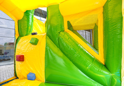 Multiplay Happy jungle bouncer with a slide for children. Buy inflatable bouncers online at JB Inflatables America