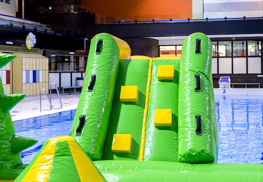 Spectacular crocodile themed play island with a vine, climbing tower, round slide and obstacles for both young and old. Buy inflatable pool games online now at JB Inflatables America