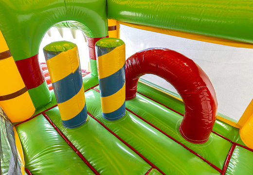 Multiplay crocodile bounce house with 3D objects inside and a slide for kids. Buy inflatable bounce houses online at JB Inflatables America
