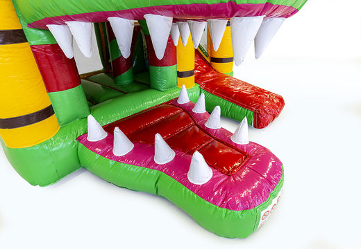 Buy a small inflatable bounce house  in a crocodile theme with slide for children. Order inflatable bounce houses online at JB Inflatables America
