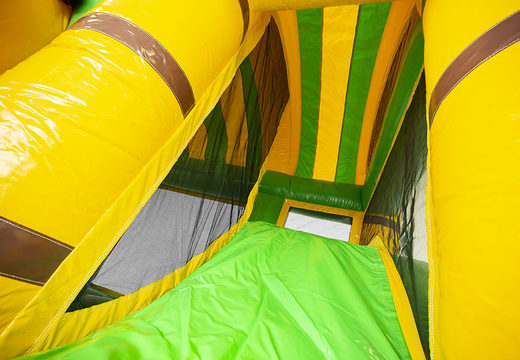 Buy a jungle world theme bouncer with a slide for children. Order inflatable bouncers online at JB Inflatables America