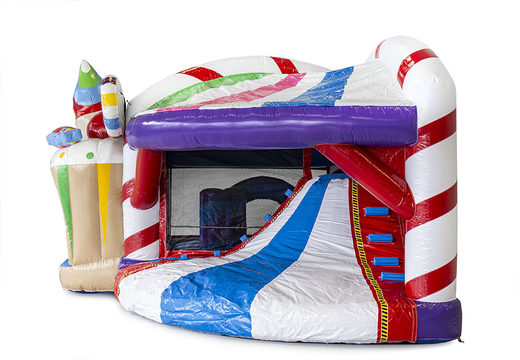 Bounce house in candyland theme with a slide for children. Buy inflatable bounce houses online at JB Inflatables America