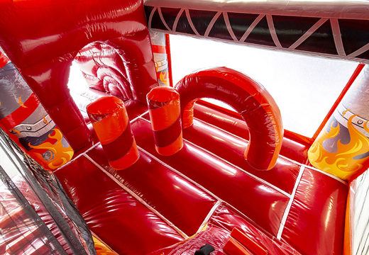 Buy medium inflatable fire brigade themed bouncer with slide for kids. Order inflatable bouncers online at JB Inflatables America