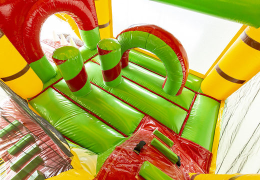 Buy medium inflatable jungle bouncer with slide for kids. Order inflatable bouncers online at JB Inflatables America
