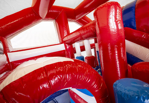 Medium inflatable bounce house in fire department theme with slide and pillars on the jumping surface, buy for children. Order inflatable bounce houses online at JB Inflatables America