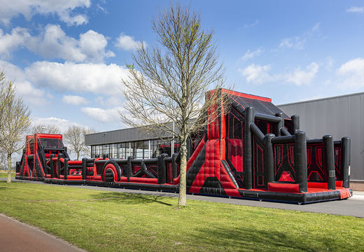 Order a unique 40 meter long red black mega alligator obstacle course. Buy inflatable obstacle courses online now at JB Inflatables America