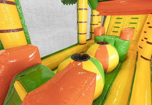 Jungle inflatable 19 meter obstacle course with suitable 3D objects for children. Buy inflatable obstacle courses online now at JB Inflatables America