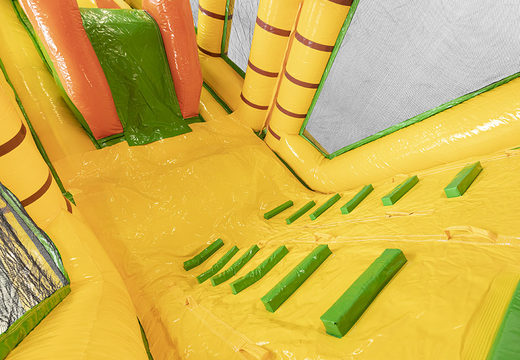 Buy a 19-meter jungle-themed obstacle course with appropriate 3D objects for kids. Order inflatable obstacle courses now online at JB Inflatables America