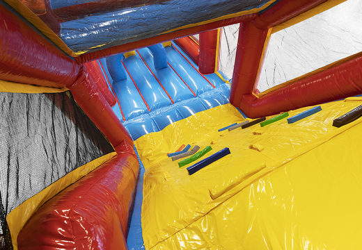 Unique 17 meter wide obstacle course in a rollercoaster theme with 7 game elements and colorful objects for kids. Buy inflatable obstacle courses online now at JB Inflatables America