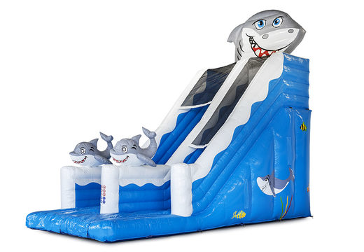 Get your inflatable shark slide with the cheerful colors, 3D objects and fun print on the side wall for children. Order inflatable slides now online at JB Inflatables America