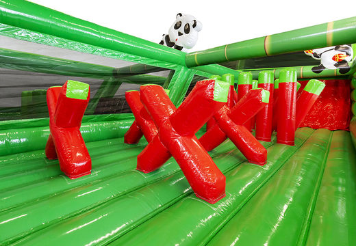 Order a custom-made inflatable Bambooo obstacle course for both young and old. Buy inflatable obstacle courses online now at JB Promotions America