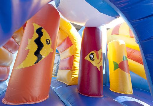 Multiplay whale bounce house with a slide, fun objects on the jumping surface and eye-catching 3D objects for kids. Order inflatable bounce houses online at JB Inflatables America