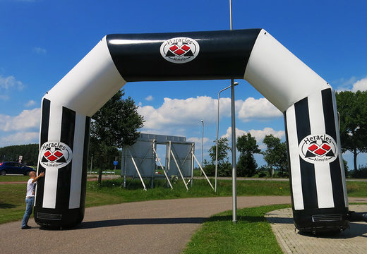 Inflatable custom Heracles almelo advertisement archwayws for sport events to buy at JB Promotions America; specialist in inflatable advertising items such as finish inflatable arches