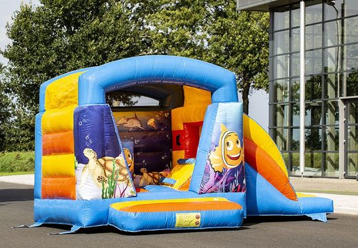 Order a small multifun blue inflatable bounce house with roof for kids in seaworld theme. Buy bounce houses online at JB Inflatables America
