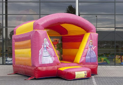 Small roofed bounce house with pink princess theme for kids for sale. Available at JB Inflatables America online
