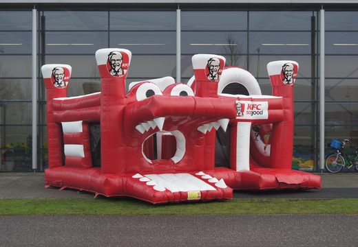 Inflatable promotional KFC Multiplay inflatable bouncer at JB Inflatables America. Request a free design for inflatable bounce houses in your own corporate identity at JB Promotions America