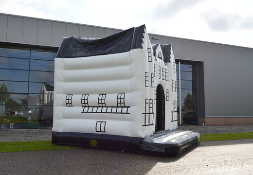 Have a personalized Castle Staverden bounce house made in your own corporate identity  at JB Promotions America. Order online promotional inflatables in all shapes and sizes