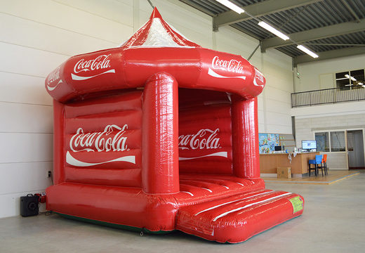 Buy promotional custom Coca-Cola Carousel bounce houses. Order now inflatable advertising bounce houses in your own corporate identity at JB Inflatables America