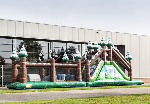 Buy inflatable unique 17 meter wide obstacle course in winter theme with 7 game elements and colorful objects for children. Order inflatable obstacle courses now online at JB Inflatables America