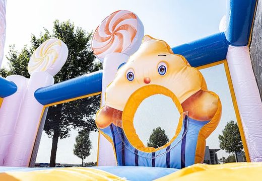 Get a big candyland themed inflatable bouncer with multiple slides and all sorts of fun obstacles with themed prints for kids. Order bouncers online at JB Inflatables America