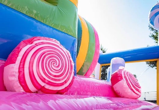 Order large inflatable bounce house in candyland theme for children. Buy bounce houses online at JB Inflatables America