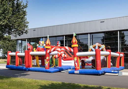 Order colored inflatable park in circus theme for children. Buy bounce houses online at JB Inflatables America